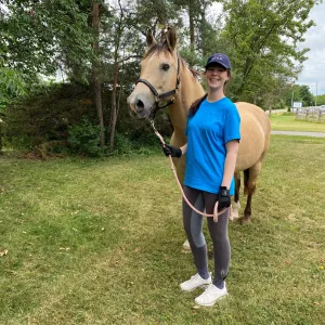 Chase standing with Rachel, our Program Assistant. 